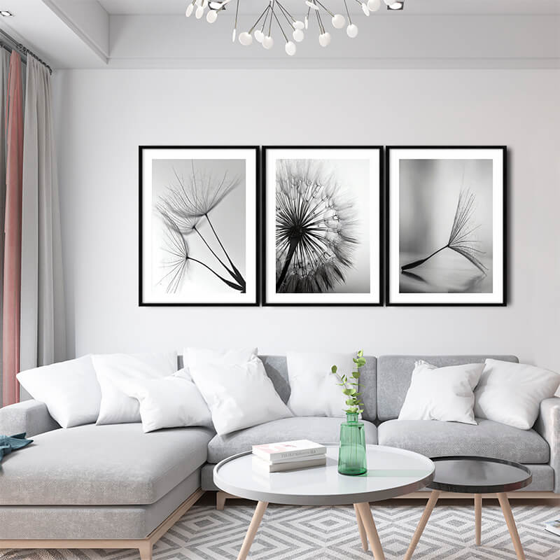 trio de quadros com imagens de flor de dente de leão em preto e branco, com nome Quadros Sinfonia de Ventos